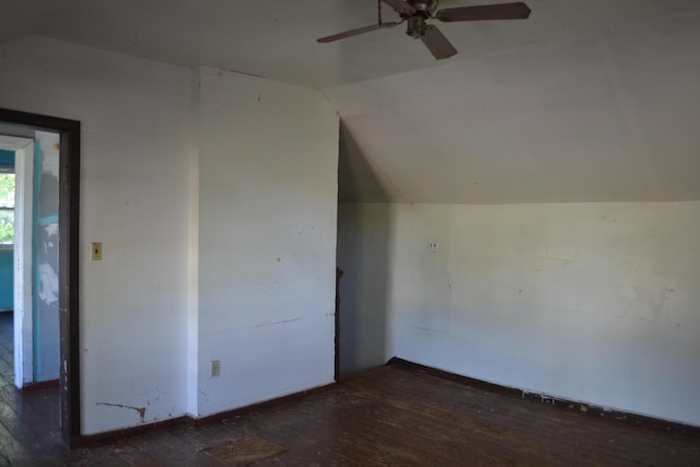 bonus room featuring ceiling fan, dark hardwood / wood-style floors, and vaulted ceiling