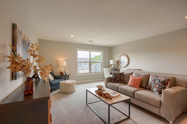 living room featuring light carpet