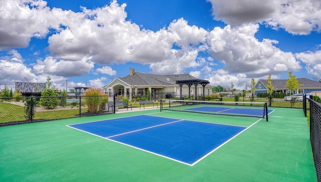 view of sport court featuring a pergola and basketball court