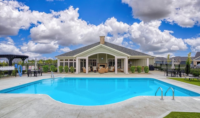 view of swimming pool featuring a patio area