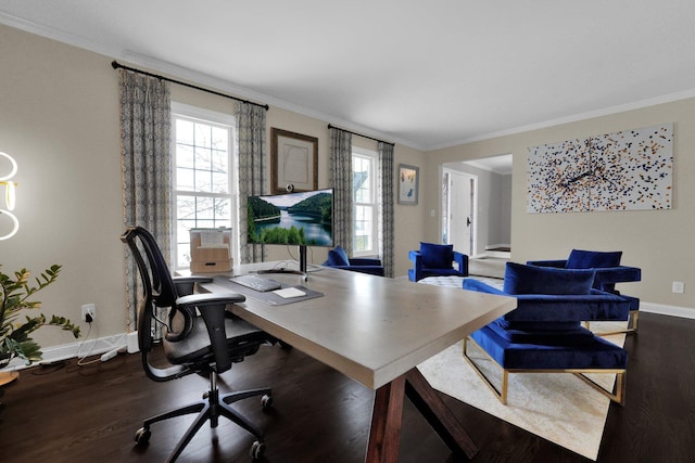 office with a healthy amount of sunlight, ornamental molding, and dark wood-type flooring