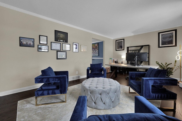 living room with hardwood / wood-style floors and ornamental molding