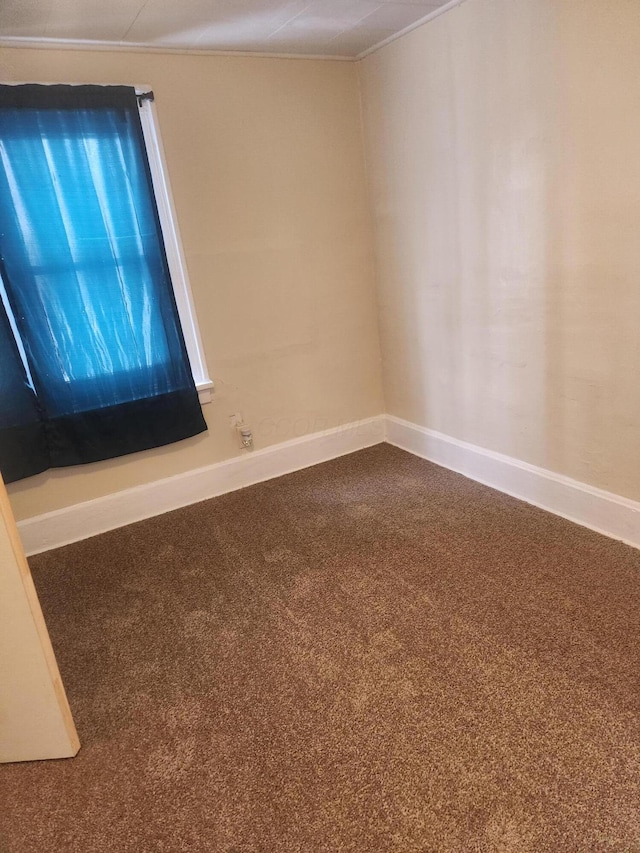 view of carpeted spare room