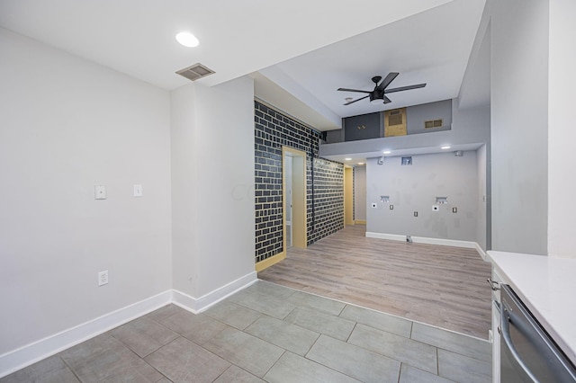 unfurnished room featuring ceiling fan and light wood-type flooring