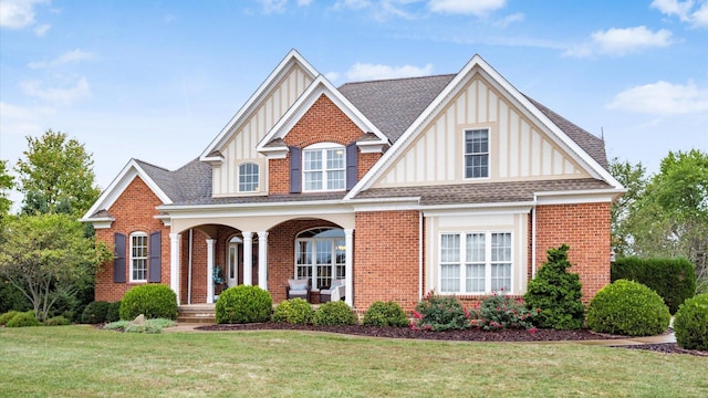 view of front of property with a front lawn and a porch