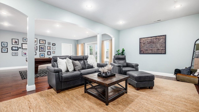 living room featuring wood-type flooring and billiards