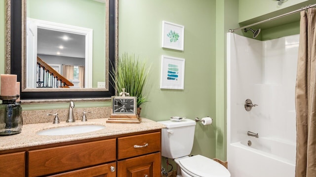 full bathroom with vanity, shower / bathtub combination with curtain, and toilet