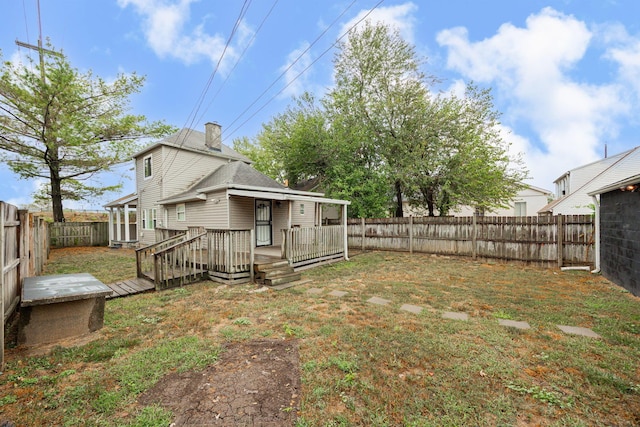 view of yard featuring a wooden deck