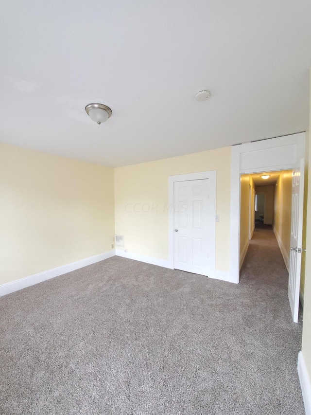 empty room with carpet floors