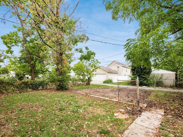 view of yard with a garage