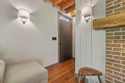 interior space featuring beam ceiling and wood ceiling