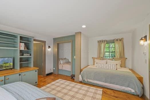 bedroom with light wood-type flooring