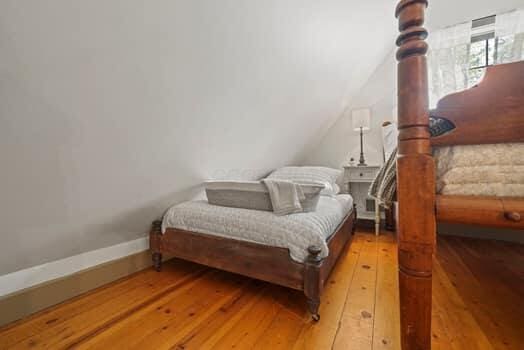 bedroom featuring hardwood / wood-style flooring