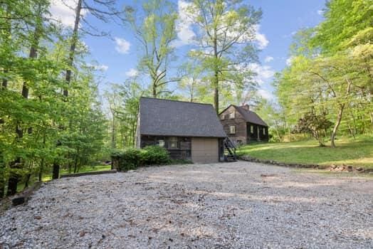 view of property exterior with a garage