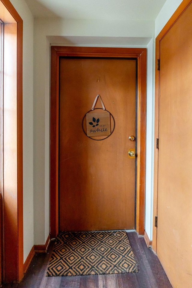 interior space with dark hardwood / wood-style flooring