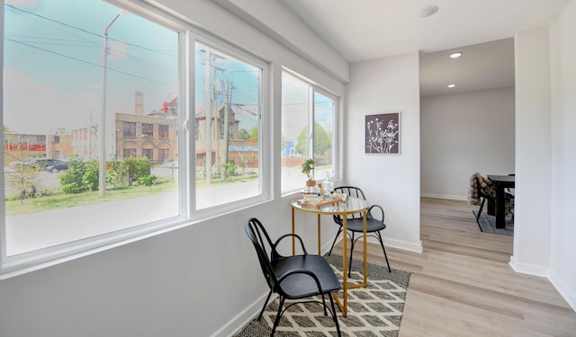 sitting room featuring light hardwood / wood-style floors