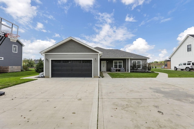 single story home with a front yard and a garage