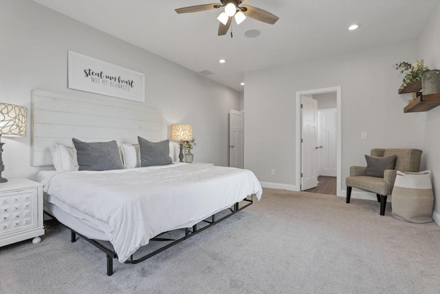 carpeted bedroom with ceiling fan