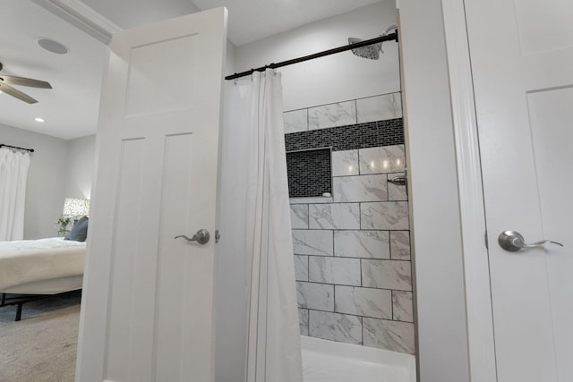 bathroom with a shower with shower curtain and ceiling fan