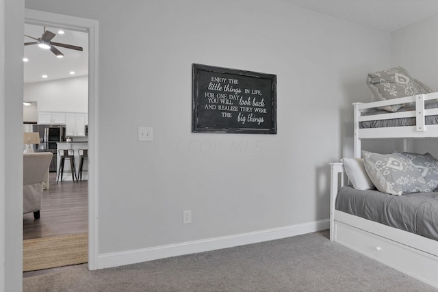 bedroom with hardwood / wood-style flooring