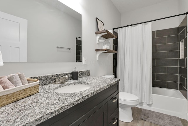 full bathroom with toilet, shower / tub combo with curtain, vanity, and hardwood / wood-style flooring