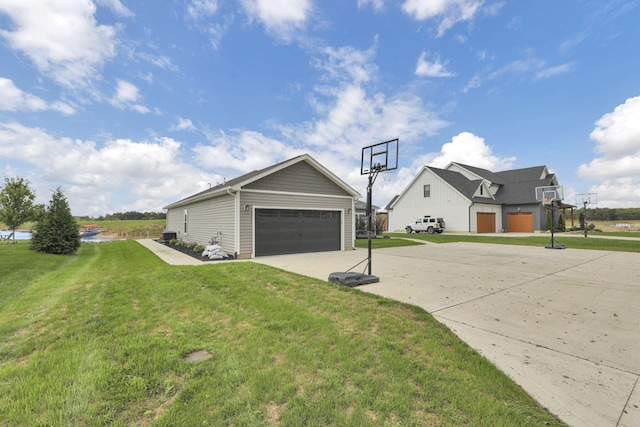 view of property exterior with a garage and a yard