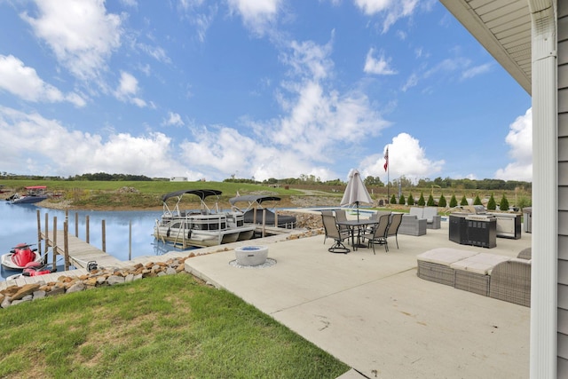 exterior space with a boat dock and a water view