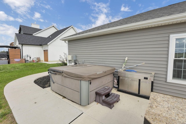 view of patio featuring a hot tub