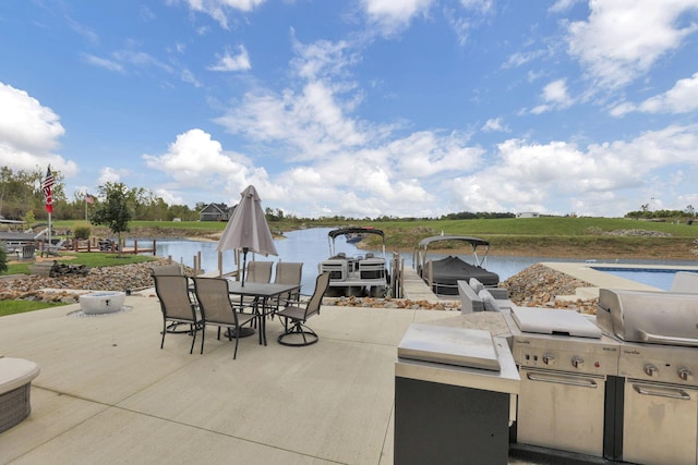 view of patio with a water view