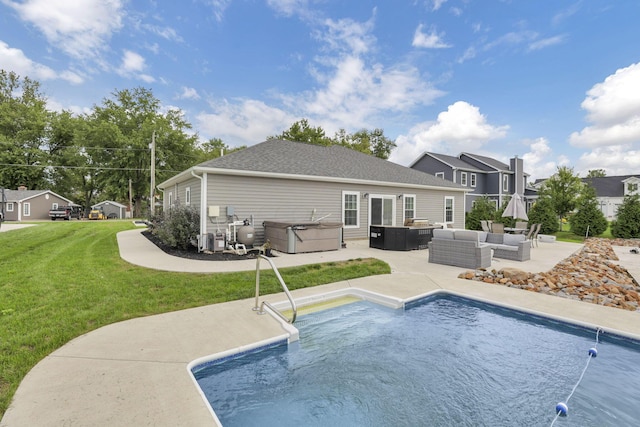 view of swimming pool featuring a yard, an outdoor living space, a hot tub, and a patio area