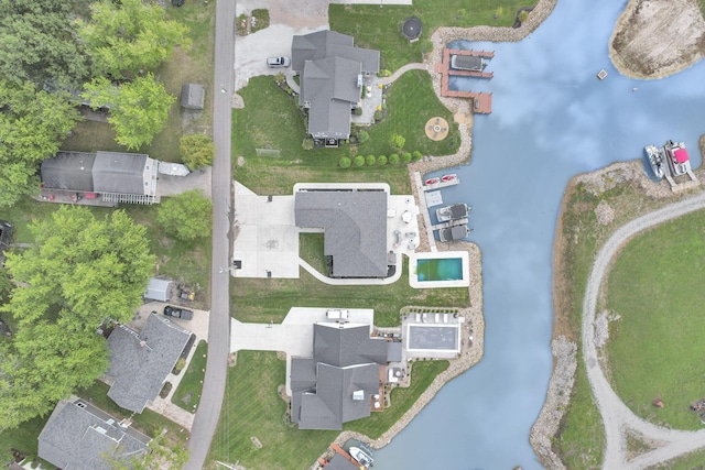 birds eye view of property featuring a water view