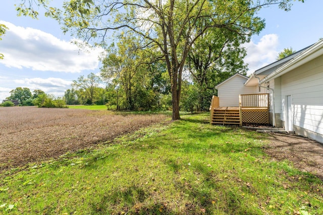 view of yard with a deck