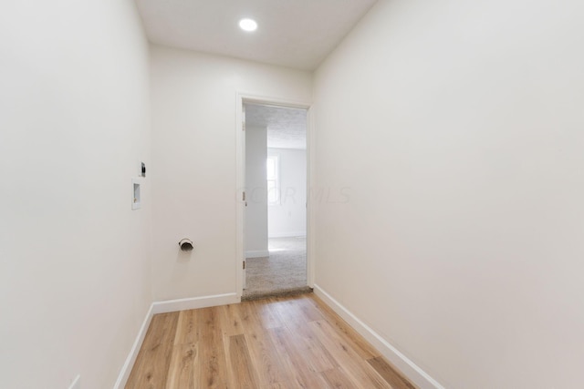 hallway featuring light hardwood / wood-style floors