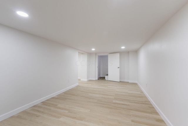 unfurnished room featuring light hardwood / wood-style floors