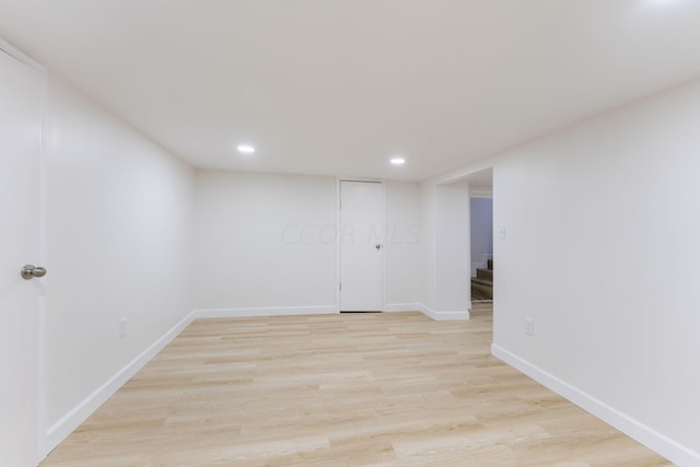 spare room with light hardwood / wood-style flooring