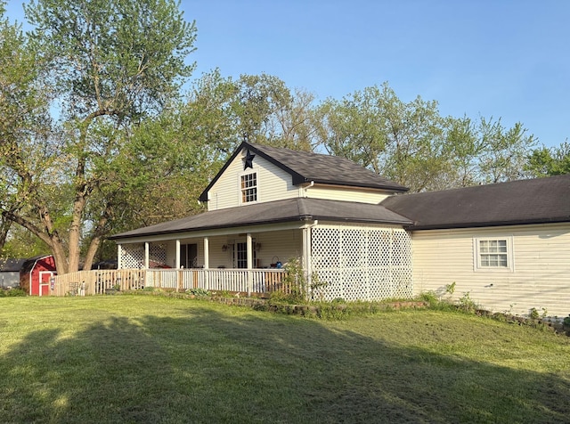 1735 Dyer Rd, Grove City, OH 43123 - exterior space featuring a storage shed, covered porch, an outdoor structure, and a front yard