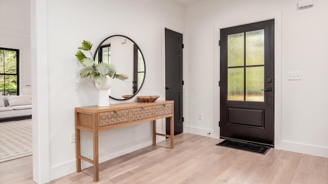 entrance foyer featuring light hardwood / wood-style floors