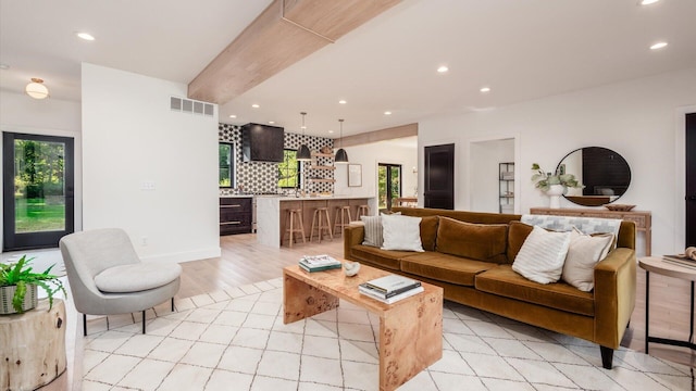 living room with light hardwood / wood-style flooring