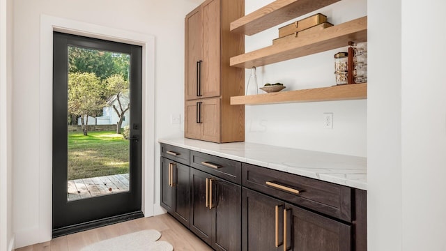 doorway featuring light hardwood / wood-style floors