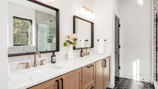 bathroom with vanity and tile patterned floors