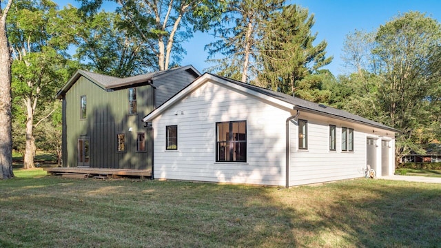 view of home's exterior with a lawn