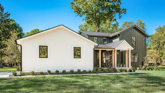 modern farmhouse with a front yard