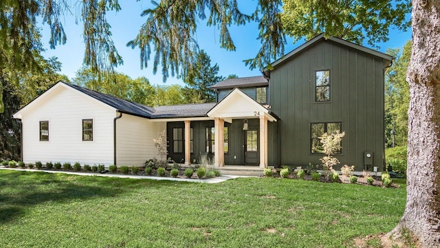 modern farmhouse with a front lawn