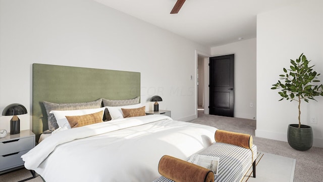 bedroom featuring ceiling fan and light carpet