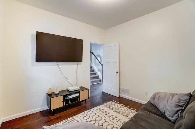 living room with dark wood-type flooring