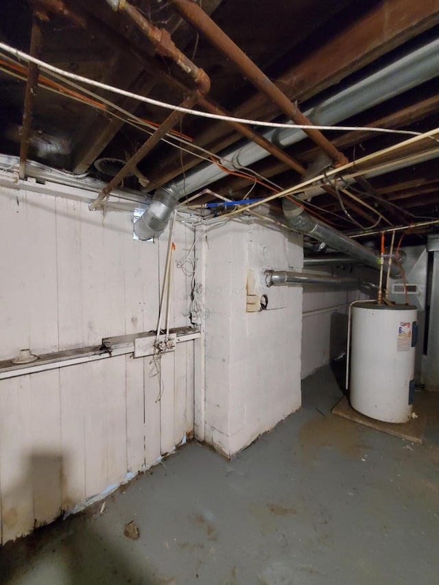 basement featuring water heater