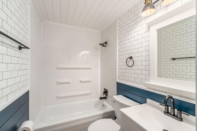 full bathroom with toilet, shower / tub combination, decorative backsplash, vanity, and tile walls