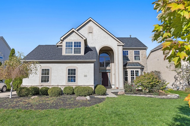 view of front of house with a front lawn