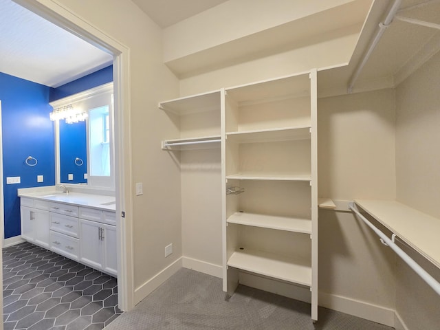 walk in closet with sink