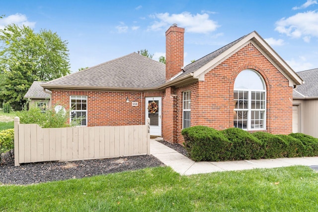 view of front of house with a front lawn